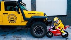-...Jeep all-terrain vehicle. Little motorcycle VS big JEEP.